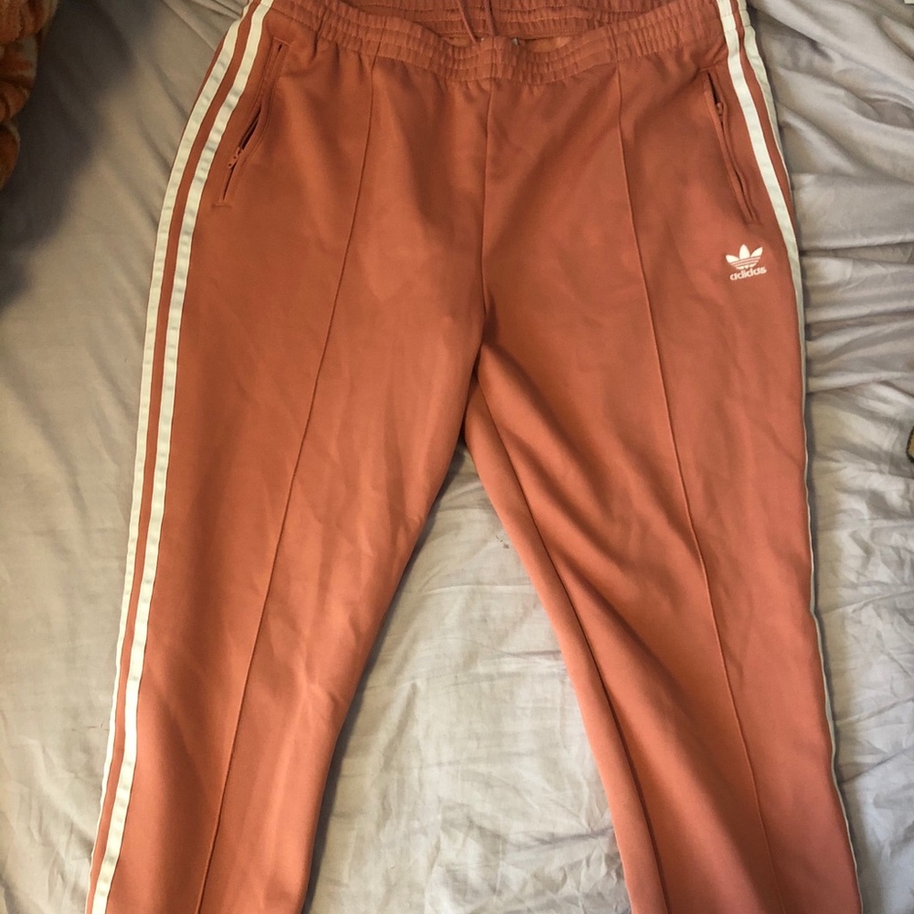 Pink adidas track pants